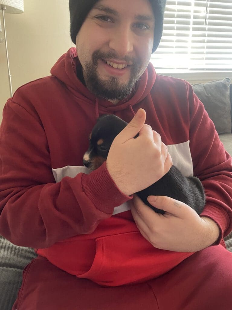 Man holding cat